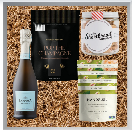 Snacks and wine gift on a textured background